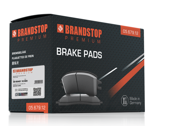 一盒优质“Brandstop”刹车片,采用黑色和橙色包装。包装盒内含一个VeoMark®激光光刻标签,用于高级防伪,结合可见和隐藏的安全元素,方便产品验证。该标签为消费者和经销商提供了高度的安全性。